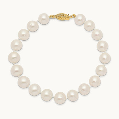 9- White Near Round Freshwater Cultured Pearl Bracelet, 14K