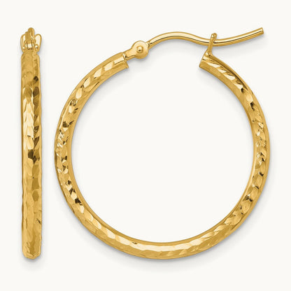 Diamond-cut Round Tube Hoop Earrings — 10K Yellow Gold