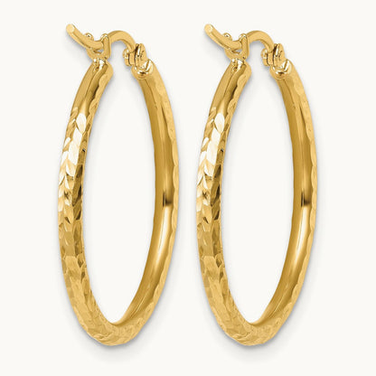 Diamond-cut Round Tube Hoop Earrings — 10K Yellow Gold