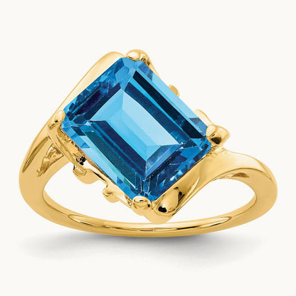 10x8mm Emerald Cut Blue Topaz ring, 14K