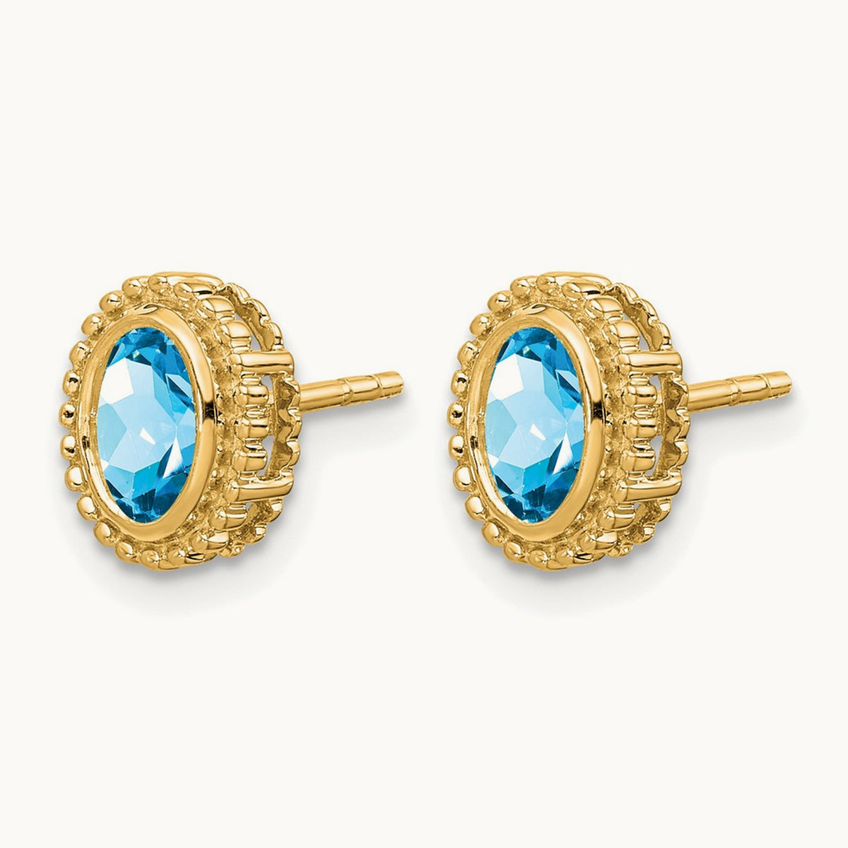 Oval Blue Topaz Post Earrings — 14K Yellow Gold