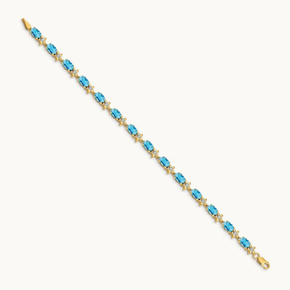 Floral Diamond and Blue Topaz Bracelet — 14K Yellow Gold