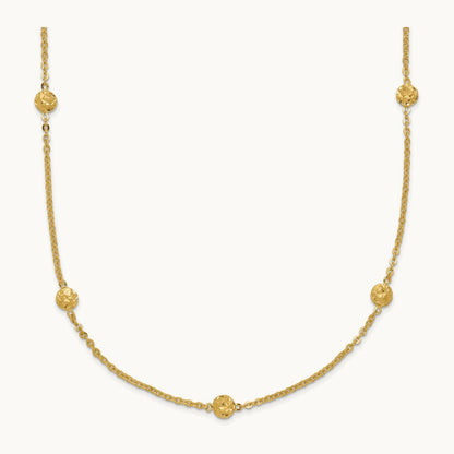 Polished Diamond-cut Tiny Puffed Circles 15-Station Necklace, 14K