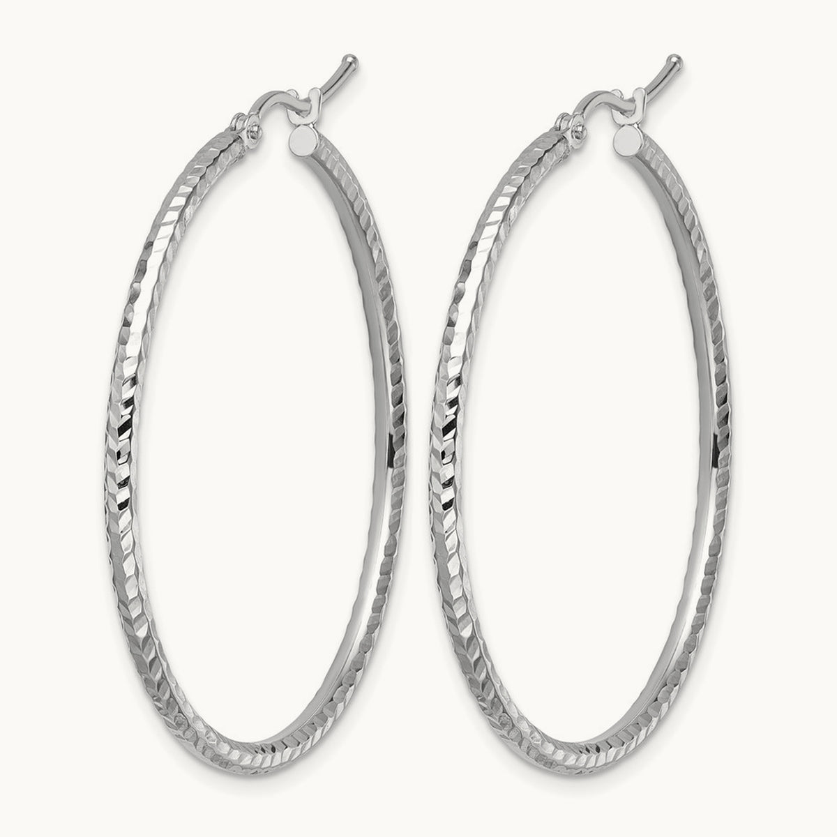 Diamond-cut Round Tube Hoop Earrings — 10K White Gold