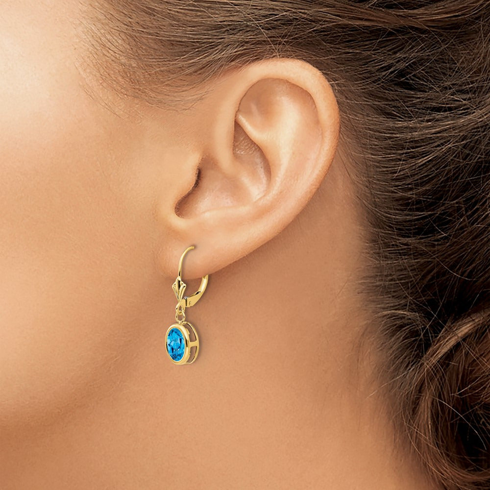 Oval Blue Topaz Leverback Earrings — 14K Yellow Gold, 27mm, 8x6mm
