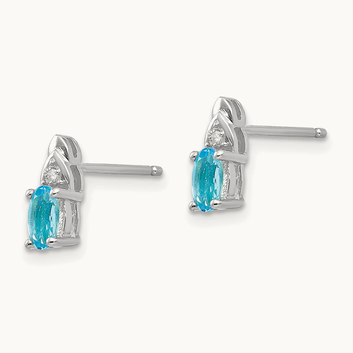 Blue Topaz and Diamond Post Earrings — photo set