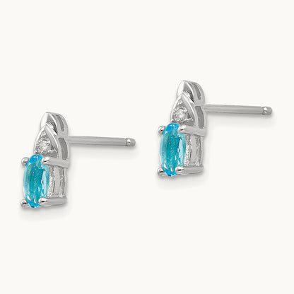 Blue Topaz and Diamond Post Earrings — photo set