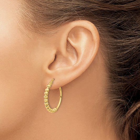 Polished Beaded Hoop Earrings — Leslie's — photo set