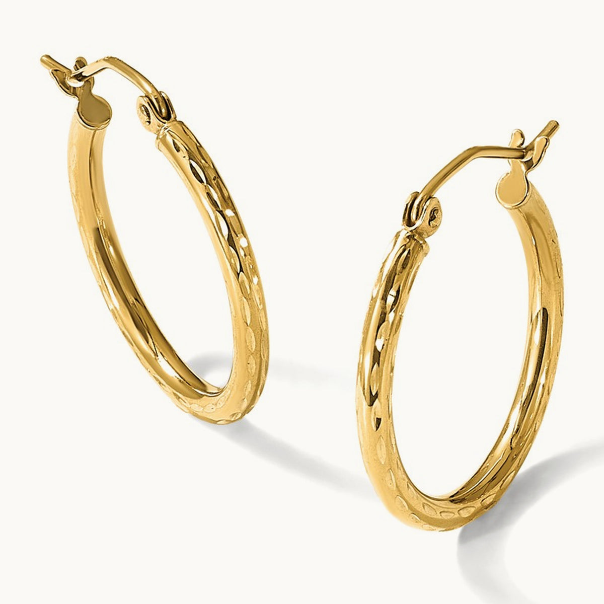 Diamond-cut Round Tube Hoop Earrings — 10K Yellow Gold