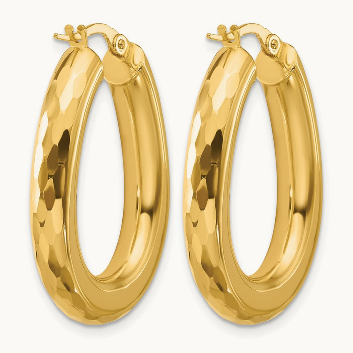 Polished and Diamond-cut Oval Hoop Earrings — Leslie's — photo set