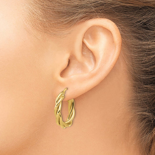 Polished Twisted Oval Hoop Earrings — Leslie's — photo set