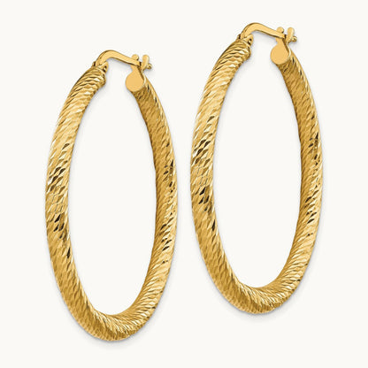 Polished Diamond-cut Round Hoop Earrings — 14K Yellow Gold