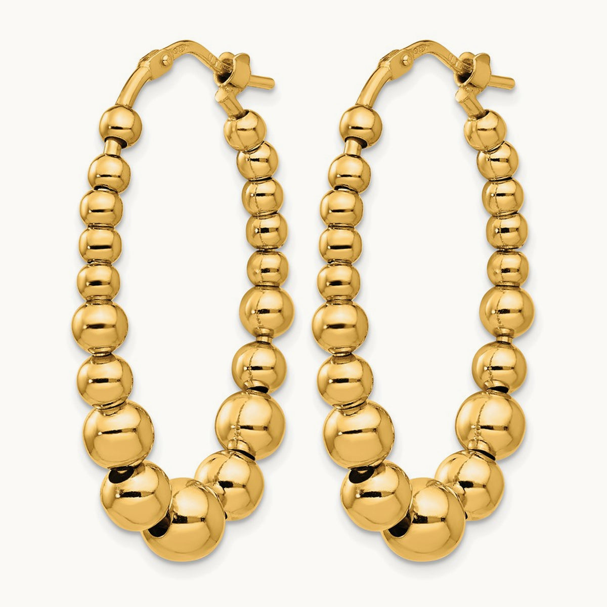 Polished Beaded Hoop Earrings — Leslie's — photo set