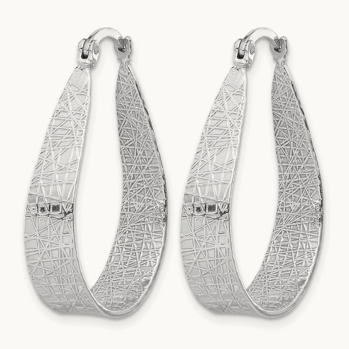 Textured Hoop Earrings — Leslie's — photo set