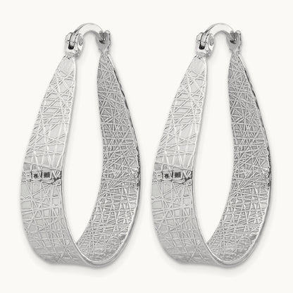 Textured Hoop Earrings — Leslie's — photo set