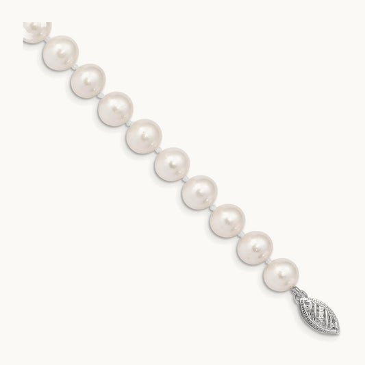 WG 7- Near Rnd White Freshwater Cultured Pearl Bracelet, 8mm, 14K