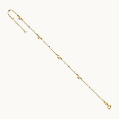 Polished 9in Plus 1in ext. D/C Bead and Bows Anklet, 14K Two-tone