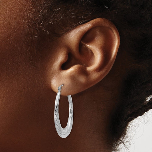 Polished and Textured Oval Hoop Earrings — photo set