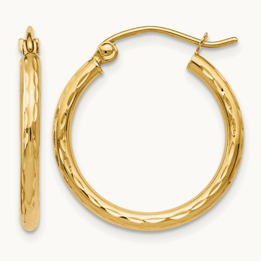 Polished and Diamond-cut Round Hoop Earrings — Leslie's — photo set