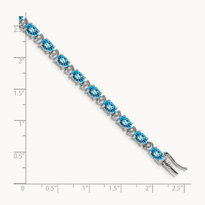 Oval Blue Topaz and Diamond Bracelet, 14K White Gold