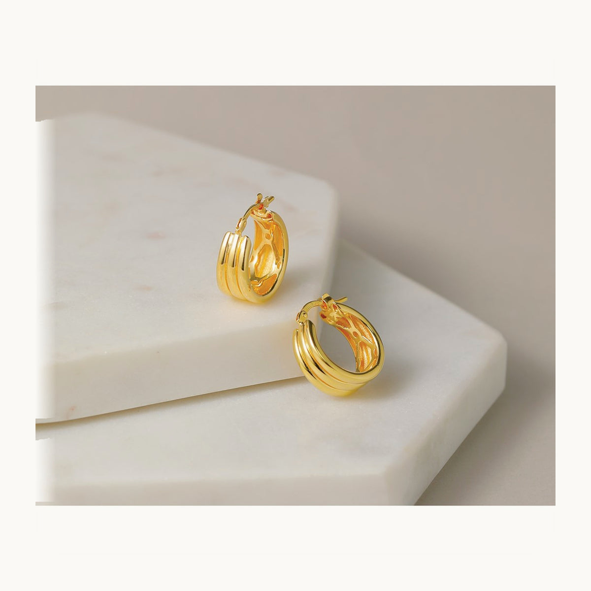 Polished and Grooved Hoop Earrings — Leslie's — photo set