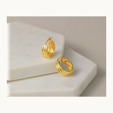 Polished and Grooved Hoop Earrings — Leslie's — photo set