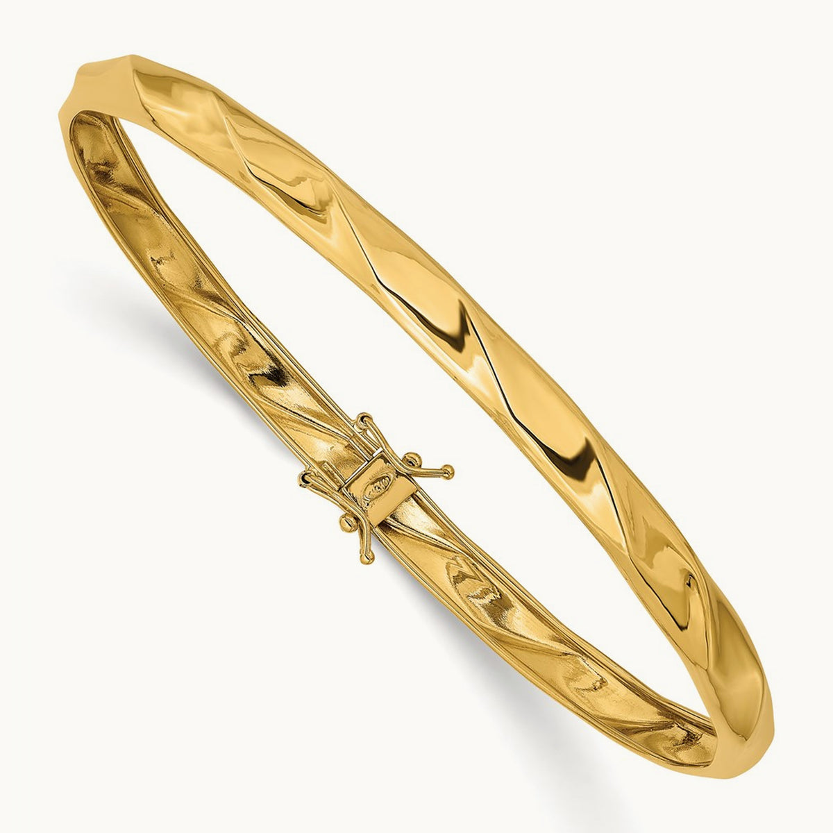 Polished Twisted Flexible Bangle — 14K Yellow Gold