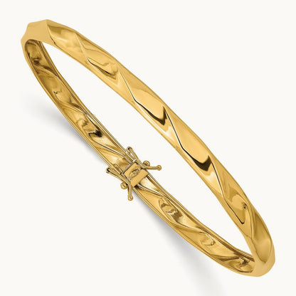 Polished Twisted Flexible Bangle — 14K Yellow Gold