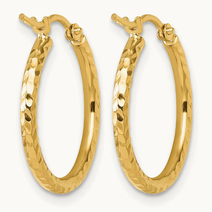 Diamond-cut Round Tube Hoop Earrings — 10K Yellow Gold