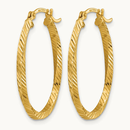 Twisted 2.5x20x29mm Oval Hoop Earrings, 14K