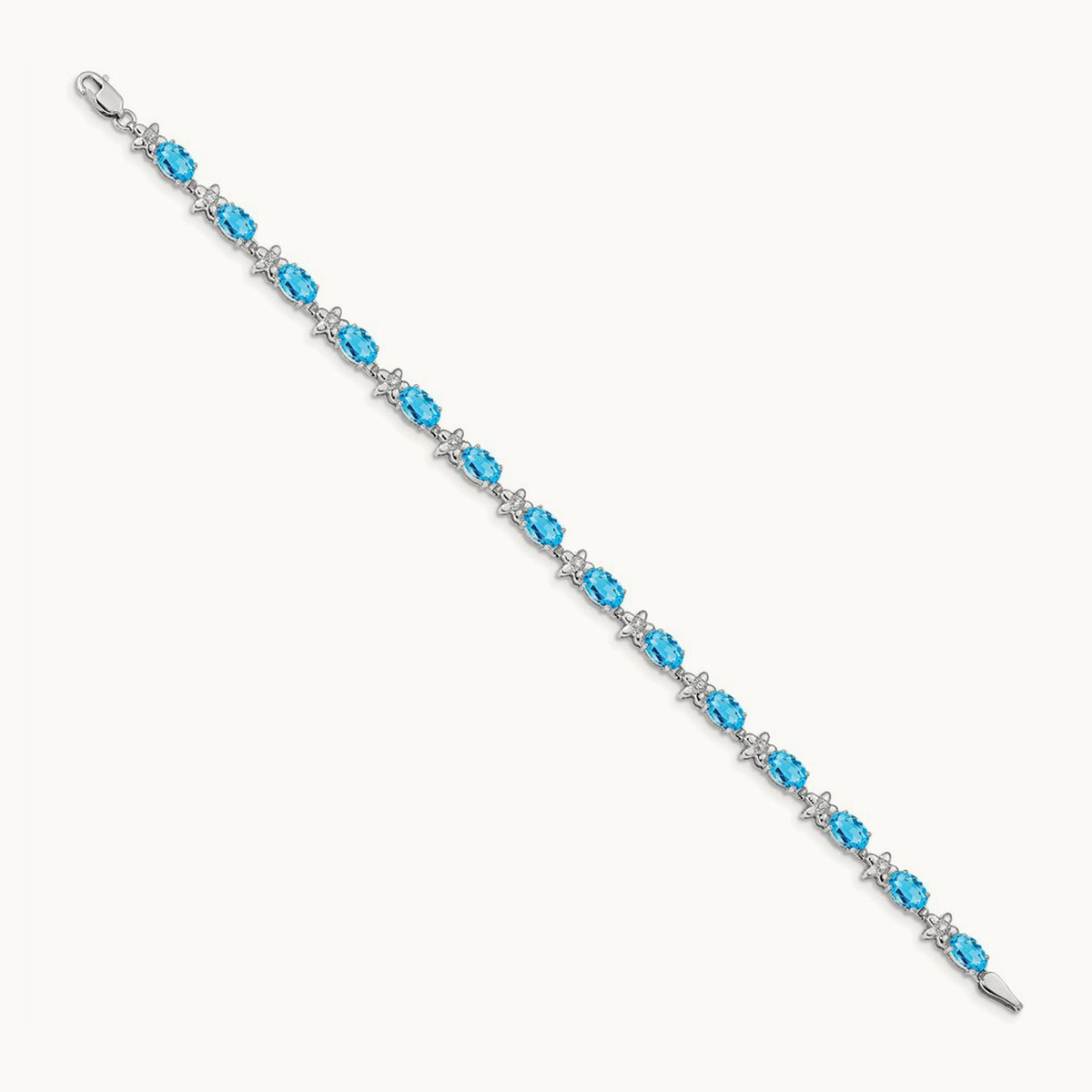 Floral Diamond and Blue Topaz Bracelet — 14K White Gold