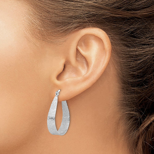 Textured Hoop Earrings — Leslie's — photo set