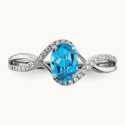Oval Blue Topaz and Diamond Twist Ring, 14K White Gold