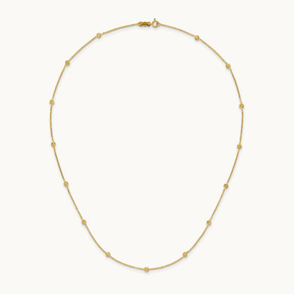 Polished Diamond-cut Tiny Puffed Circles 15-Station Necklace, 14K