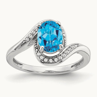 Oval Blue Topaz and Diamond Bypass Ring, 14K White Gold