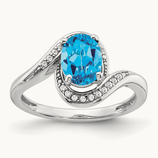 Oval Blue Topaz and Diamond Bypass Ring, 14K White Gold