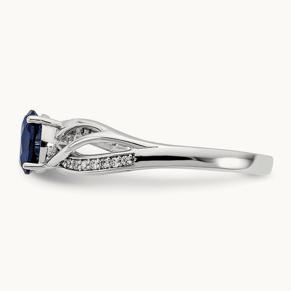 Polished Sapphire and Diamond Ring