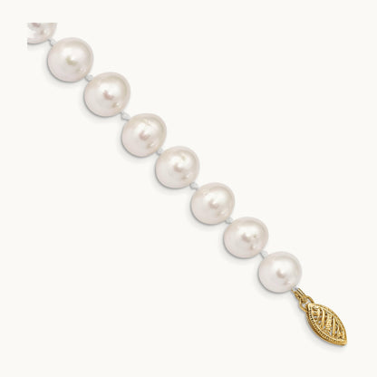 9- White Near Round Freshwater Cultured Pearl Bracelet, 14K
