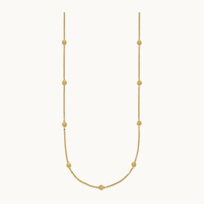 Polished Diamond-cut Tiny Puffed Circles 15-Station Necklace, 14K